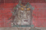 West wall - detail of theatre mask photograph